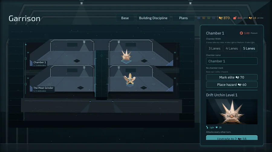 The garrison screen. Chambers and defenses are laid out in the player's base.